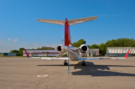 business plane parked at the airport photo