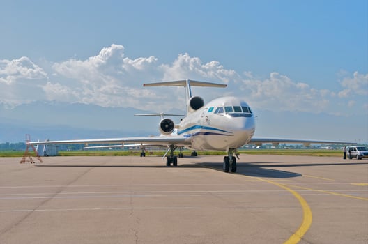 business plane parked at the airport photo