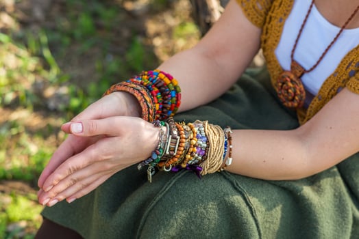 Fashion shot of a beautiful boho style girl on nature background. Boho, hippie. photo