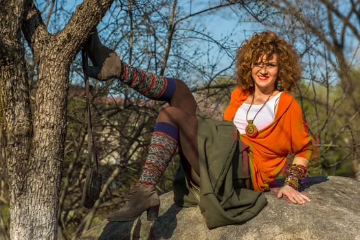 Fashion shot of a beautiful boho style girl on nature background. Boho, hippie. photo