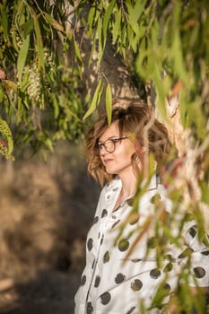 Fashion shot of a beautiful boho style girl on nature background. Boho, hippie. photo