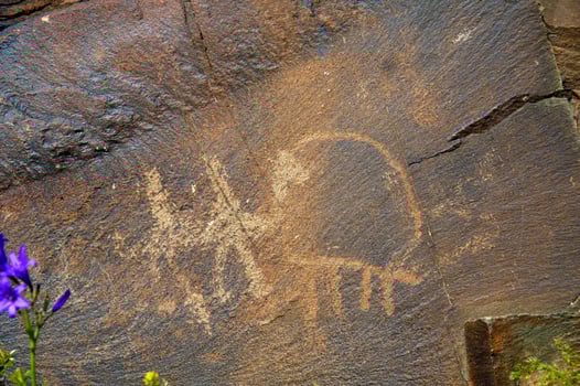 Petroglyphs within the Archaeological Landscape of Tamgaly. Almaty area, Kazakhstan photo