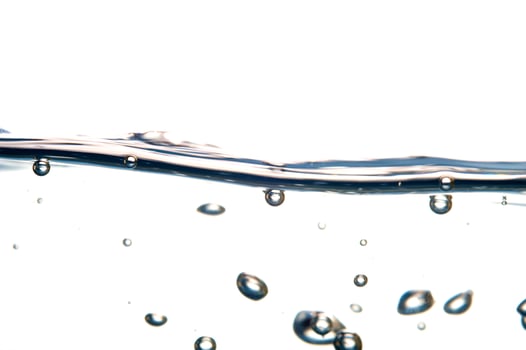 Fresh water with waves and bubbles photo