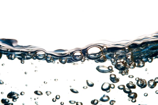 Fresh water with waves and bubbles photo