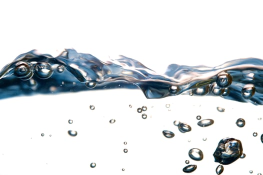 Fresh water with waves and bubbles photo