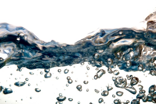 Fresh water with waves and bubbles photo