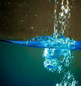 Fresh water with waves and bubbles photo