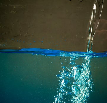 Fresh water with waves and bubbles photo