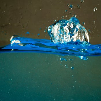 Fresh water with waves and bubbles photo