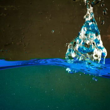 Fresh water with waves and bubbles photo