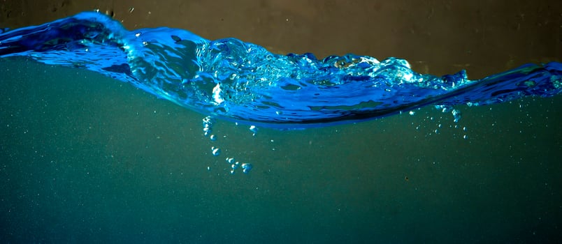 Fresh water with waves and bubbles photo