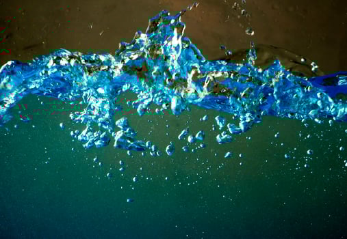Fresh water with waves and bubbles photo