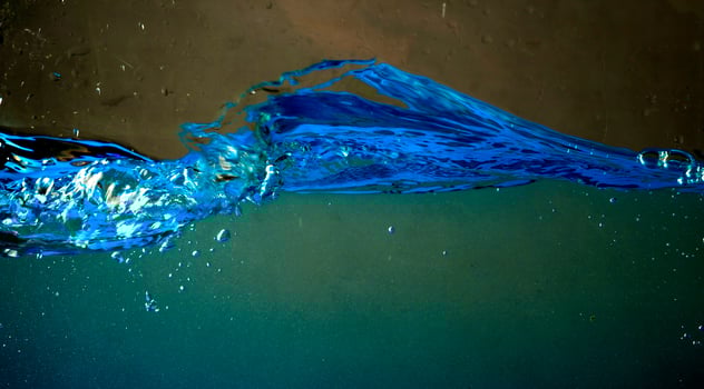 Fresh water with waves and bubbles photo