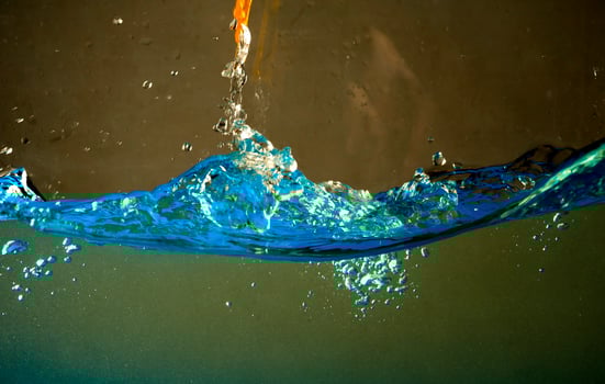 Fresh water with waves and bubbles photo