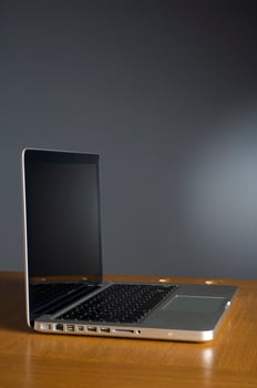 Professional Laptop on gray background photo
