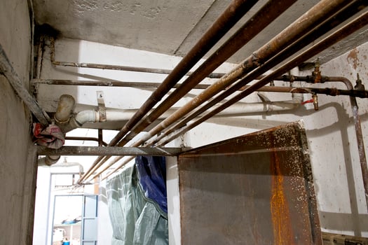 Old pipes in a basement photo