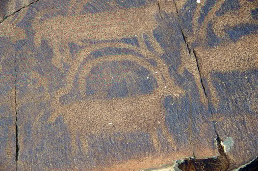 Petroglyphs within the Archaeological Landscape of Tamgaly. Almaty area, Kazakhstan photo