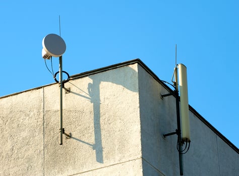 detailed communication antenna on a blue sky photo