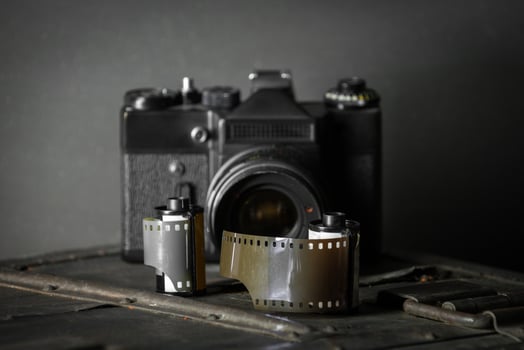 Old retro camera and 35 mm photo