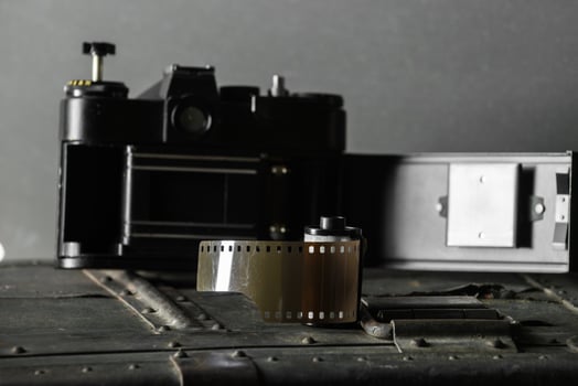 Old retro camera and 35 mm photo