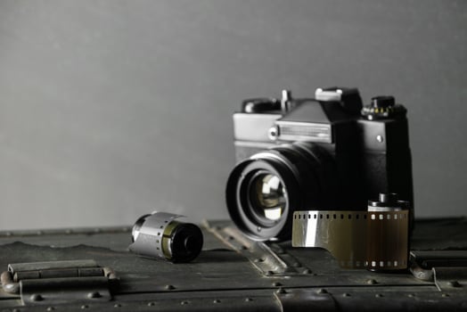 Old retro camera and 35 mm photo