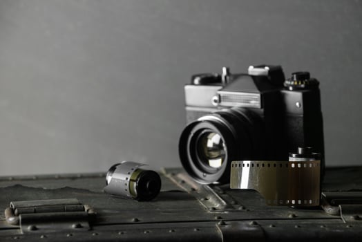 Old retro camera and 35 mm photo