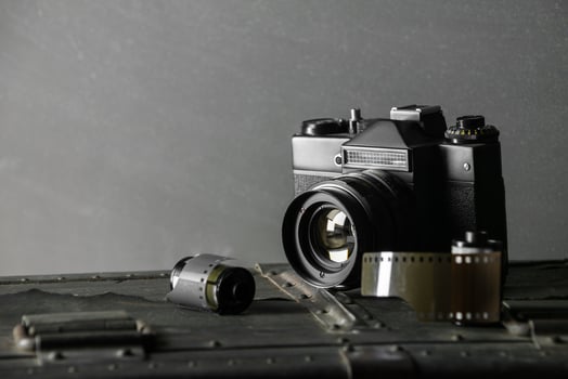 Old retro camera and 35 mm photo