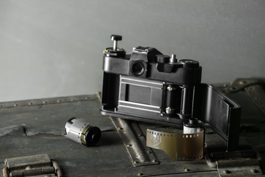 Old retro camera and 35 mm photo