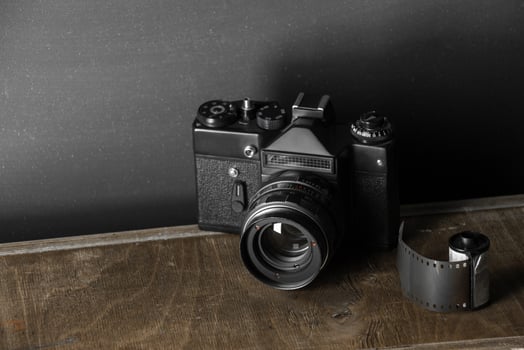 Old retro camera and 35 mm photo