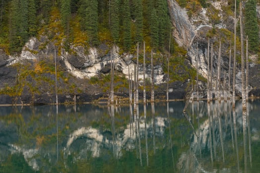 Kaindy lake in Tien-Shan mountains, Kazakhstan photo