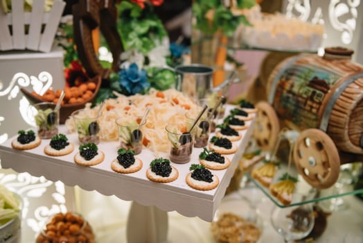 desserts with fruits, mousse, biscuits. Different types of sweet pastries, small colorful sweet cakes, macaron, and other desserts in the sweet buffet. candy bar for birthday. photo