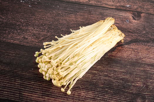 Tasty raw enoki mushroom heap photo