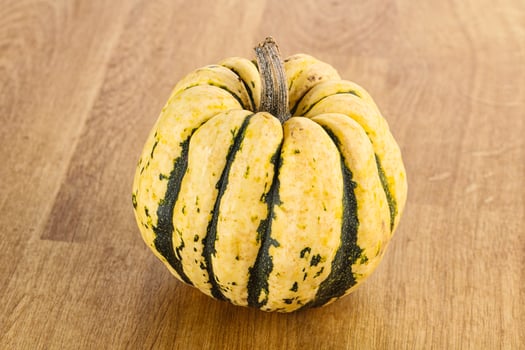 Ripe raw fresh decorative pumpkin photo