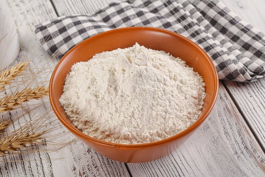 Wheat flour heap for bake photo