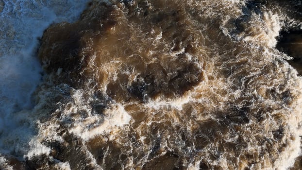 waterfall in river in top view photo