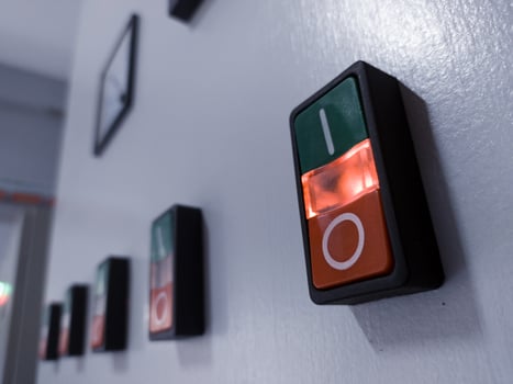 ON-OFF Switches with indicator light on in electrical panel control. photo