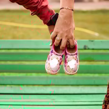 Indian couple posing for Maternity shoot pose for welcoming new born baby in Lodhi Garden in Delhi India, Maternity photo shoot done by parents for welcoming their child, Pre Baby Photo Shoot