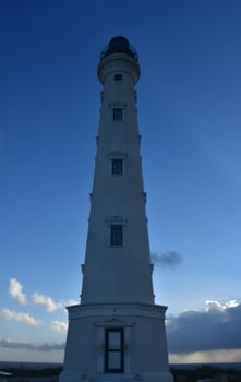 Imposing Lighthouse Rising up the Blue Skies photo