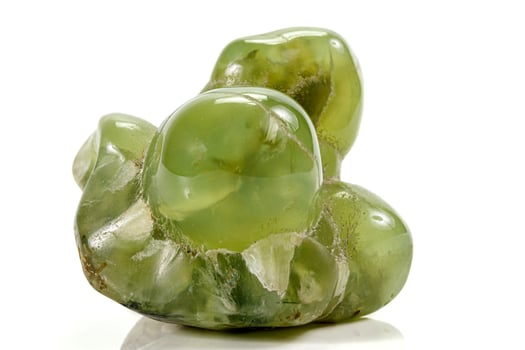 Macro stone Prehnite mineral on white background photo