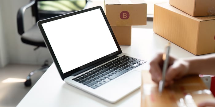 Mockup of white empty display laptop with box. Concept of online business photo