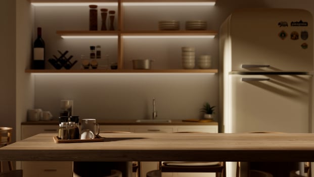 A space on a hardwood dining table in a modern, minimalist kitchen, complete with kitchen appliances photo