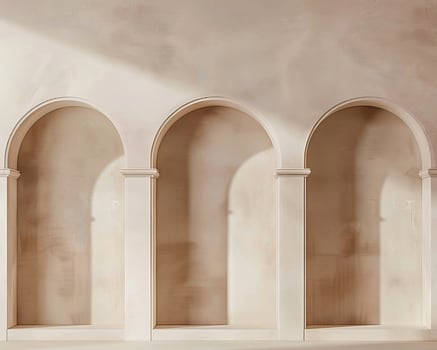 Three arched niches in a beige wall photo