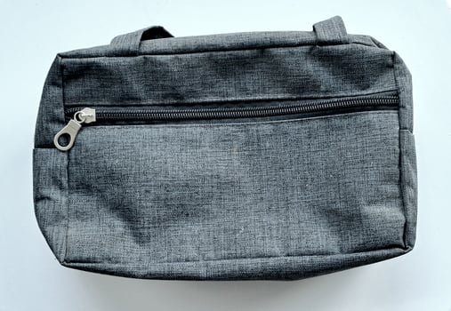 Pouch or bag fabric with gray color on white background photo