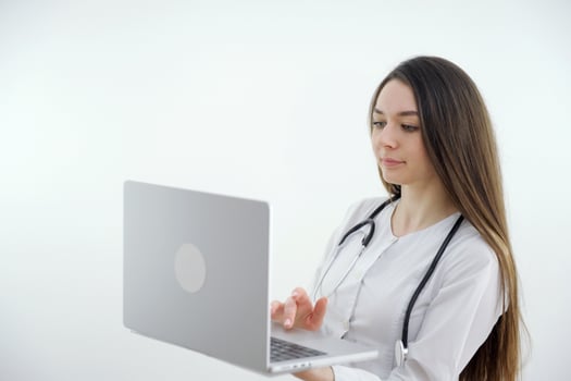 Shoulder view young woman consulting with family therapist doctor general practitioner online via call on laptop after feeling first virus illness symptoms, medical insurance, covid19 outspread. photo