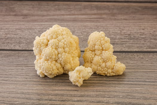Raw white cauliflower cabbage heap photo