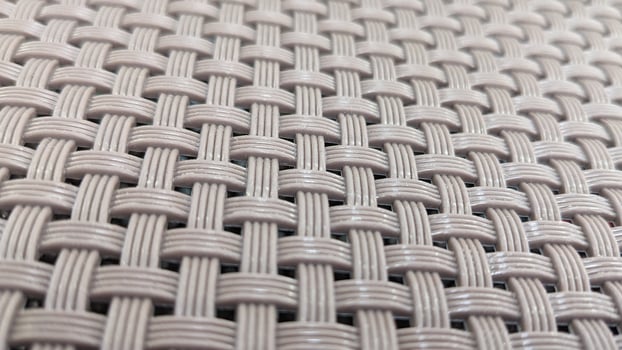 A woven pattern of white and black photo