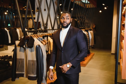 African American man in stylish new clothes on the street photo