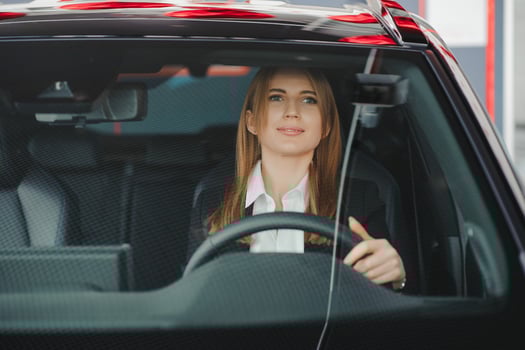 Salesperson selling cars at car dealership. photo
