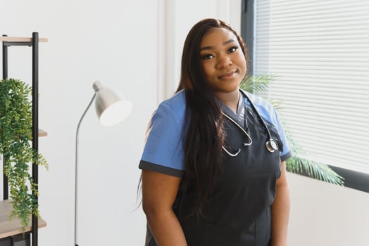 medicine, people and healthcare concept - african american female doctor or nurse at hospital. photo