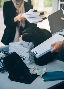 Stressful business man have so many paperwork in the office photo